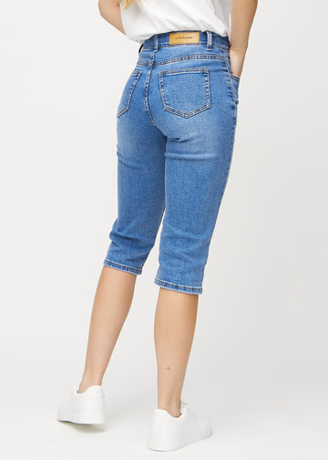 Denim regular capris sedda bakifrån, så att hela produkten syns.